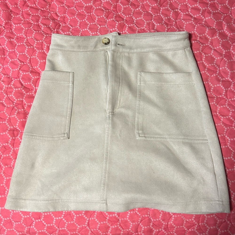 Creme velvet skirt.